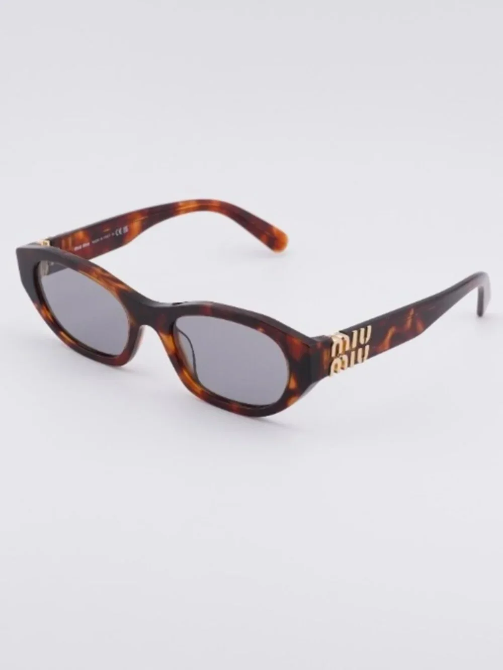 Miu Miu MUA03S 21C40O Sunglasses Havana Mahogany Oval Frame, Grey Lenses